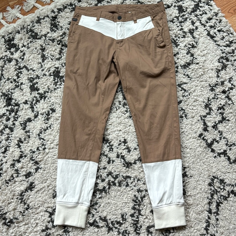 Standard smith slim khaki pant with white top detail and calf bottoms